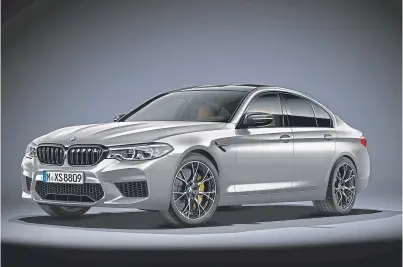  ??  ?? The need for speed: The M5 Competitio­n is faster than its main rival from Mercedes.
