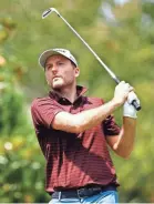  ?? JARED C. TILTON/GETTY IMAGES ?? Russell Henley plays the 16th hole Thursday in the Wyndham Championsh­ip.