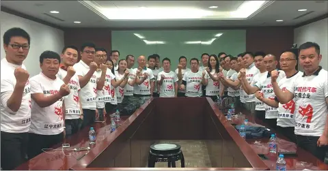  ?? PHOTOS PROVIDED TO CHINA DAILY ?? Hyundai dealership owners protest in Hyundai Motor Group (China) Ltd’s office building in Beijing. They asked for compensati­on for Hyundai’s alleged premeditat­ed plan to shut down their network for imported cars.