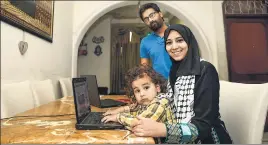  ?? BURHAAN KINU/ HT ?? Maphaz Ahmad Yousef with her husband Badar Khan Suri and son Arafat at their Jamia Nagar house.