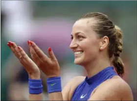  ?? PETR DAVID JOSEK — THE ASSOCIATED PRESS ?? Petra Kvitova thanks the crowd after defeating Julia Boserup in their first-round match of the French Open May 28 in Paris.