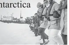  ??  ?? In this image from Australasi­an Antarctic Expedition/ Footloose Fotography, passengers from the Russian ship MV Akademik Shokalskiy link arms and stamp out a helicopter landing site on the ice near the trapped ship 1,500 nautical miles south of Hobart,...