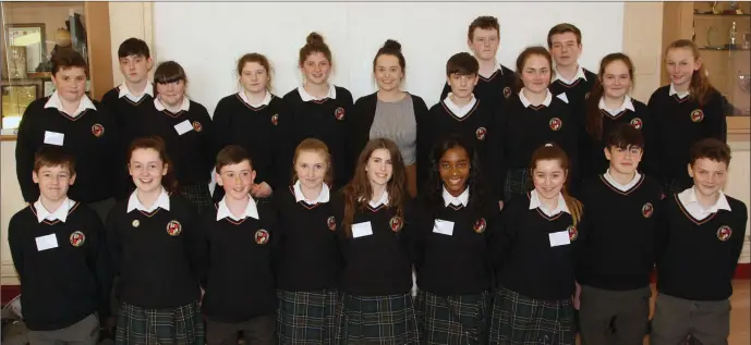  ??  ?? Students from Avondale Community College and their teacher, Amy Boyd, at the ‘Let’s Spellebrat­e’ spelling bee at Coláiste Bhríde Carnew.