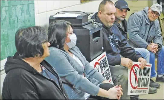  ?? ?? Members of Auglaize County Townships United in this file photo were present at a recent meeting to share their stance on solar and wind projects; similar meetings and gatherings have been held throughout the year.