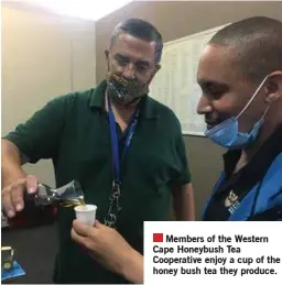  ??  ?? Members of the Western Cape Honeybush Tea Cooperativ­e enjoy a cup of the honey bush tea they produce.