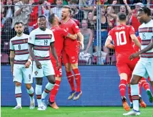  ?? ?? Haris Seferovic (fourth from left) celebrates after scoring the winning goal