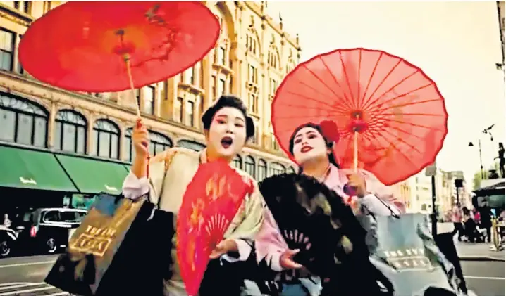  ??  ?? The video to promote The Ivy Asia included two ‘geishas’, above, a ‘Fu Manchu-style’ rickshaw driver, right, and women dancing in silk dresses. Left: performers dressed as samurai and a Chinese lion at the launch event