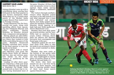  ??  ?? Dabang Mumbai’s Diwakar Ram in action against Parwinder Singh of Delhi Waveriders in their HIL- 4 match in New Delhi on Tuesday. Mumbai won 8- 3.