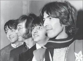  ??  ?? The Beatles, from left, Paul McCartney, John Lennon, Ringo Starr and George Harrison in 1968