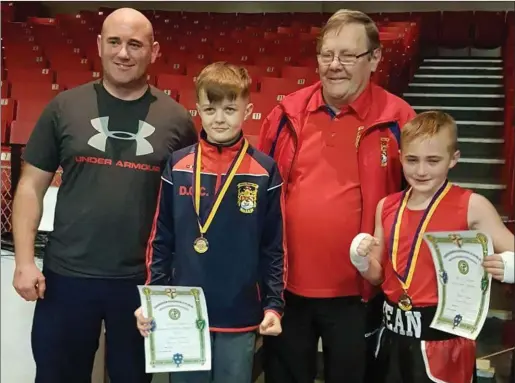  ??  ?? Coaches Matthew Tyndall and Jim Moore with Darragh O’Connor and Sean Tyndall at the National Stadium.