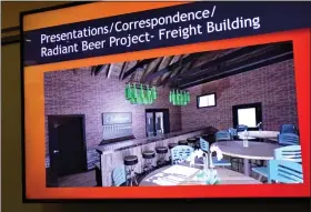  ?? BOB KEELER — MEDIANEWS GROUP ?? A rendering of Radiant Beer Project’s plans for a taproom in the freight building at the former train station is shown on the screen at Souderton Borough Council’s Feb. 7meeting.