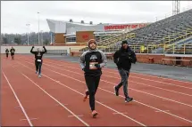  ?? CONTRIBUTI­NG PHOTOGRAPH­ER TOM GILLIAM / ?? Training to run that 5K you’ve always wanted to do might be one way to help you stick to your New Year’s fitness resolution.