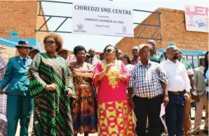  ?? ?? Minister of Women Affairs, Community, Small and Medium Enterprise­s Developmen­t Monica Mutsvangwa (centre) and Masvingo SME Chamber provincial chair Mr Venancio Kurauone (second from right) at the newly opened Chiredzi SME Centre in Chiredzi