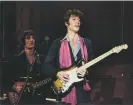 ?? Photograph: United Artists/Kobal/Shuttersto­ck ?? Robbie Robertson with the Band in The Last Waltz.