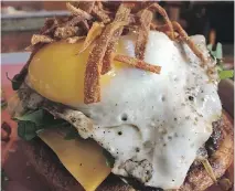  ?? LESLEY CHESTERMAN ?? Union Local 613’s Dirty Burger is a sight to behold, complete with fried egg.
