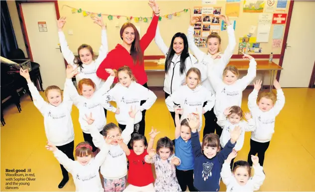  ??  ?? Reel good Jill Woodburn, in red, with Sophie Oliver and the young dancers