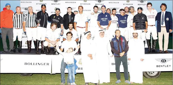  ?? Photos by Gonzalo Etcheverry. ?? Players stand on the podium after the awarding ceremony as officials look on.