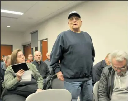  ?? EDDIE CHAU Staff Photo ?? Doan’s Ridge Rd. resident Gord Schaubel expresses his concerns about the proposed Welland Ridge Solar Energy Project in front of about 50 people assembled at Welland Civic Square, Wednesday.