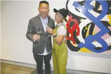  ?? ?? LOOK 2022 was a feast for the senses including food and beverages sponsored by Concorde Entertainm­ent Group. Pictured are Concorde's Victor Choy and his wife Diane Choy.