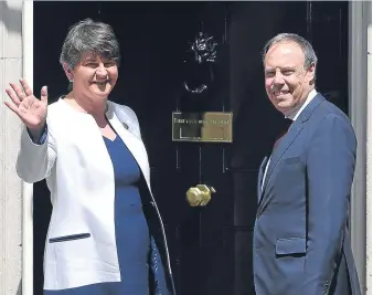  ?? Picture: Getty Images. ?? DUP leader Arlene Foster and MP Nigel Dodds arrive at 10 Downing Street for talks with Theresa May, a developmen­t that concerns Alex.