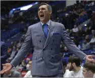  ?? ASSOCIATED PRESS FILE ?? Villanova coach Jay Wright, seen in an NCAA Tournament game against St. Mary’s in March, is back on the Main Line wiser for the experience of having coached with Team USA at the FIBA World Cup this month.