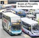  ??  ?? Buses at Piccadilly in Manchester