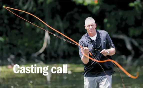  ?? Pam Panchak/Post-Gazette ?? Eddie Matuizek, president of the Pittsburgh Casting Club, demonstrat­es sidearm casting on Carnegie Lake in Highland Park.