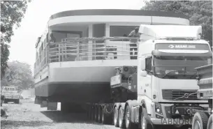  ??  ?? A Victoria Falls-bound houseboat was yesterday spotted just before Lupane town still moving at a snail’s pace due to trees overhangin­g on the road. Motorists travelling along the Bulawayo-Victoria Falls Road are advised to exercise caution as they will...