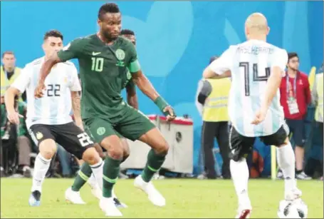  ?? abiodun ajala ?? Super Eagles captain, John Mikel Obi, in contest for the ball with Argentine veteran, Mascherano, some hours after the news of his father’s kidnap was broken to him during the last group D match in Saint Petersburg