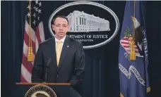  ?? EPA ?? Deputy Attorney General Rod Rosenstein announces that 13 Russians will be indicted for intent to interfere in the election