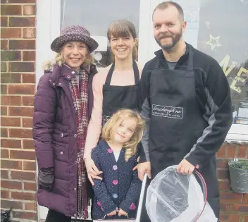  ??  ?? Councillor Galbraith with Eloise, Darren and Imogen, of Strawberry Rose, getting ready to do their bit to keep Herrington tidy.