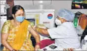  ?? ANI ?? A health worker administer­s the first dose of Covid-19 vaccine to a beneficiar­y in Patna on Monday.