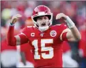  ?? CHARLIE NEIBERGALL — THE ASSOCIATED PRESS ?? The Kansas City Chiefs’ Patrick Mahomes reacts after throwing a touchdown pass to Tyreek Hill during the first half of the NFL AFC Championsh­ip football game against the Tennessee Titans Sunday in Kansas City, Mo.