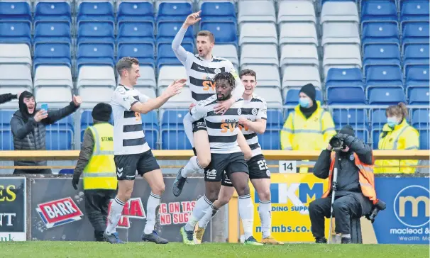  ?? ?? Tomi Gun Adeloye doubles Ayr’s lead just six seconds after coming on for Sam Ashford as he redirected a Mark McKenzie cutback into the net to give Ayr a vital cushion in Inverness