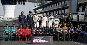  ?? ?? The 20 drivers posed for an end-of-season picture in Abu Dhabi last year. Amazingly, the exact same 20 drivers will be in Bahrain this year posing for the start-of-the season shot