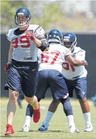  ?? Tim Warner ?? Texans defensive end J.J. Watt (99) is running on a full tank. “I have no restrictio­ns from anybody. I’m practicing full-go. This is my natural habitat (and) I feel great.”