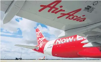  ??  ?? FLYING HIGH: Low-cost airlines like AirAsia have grown massively on the back of Asia’s burgeoning middle class, outpacing the supply of qualified pilots in the region.