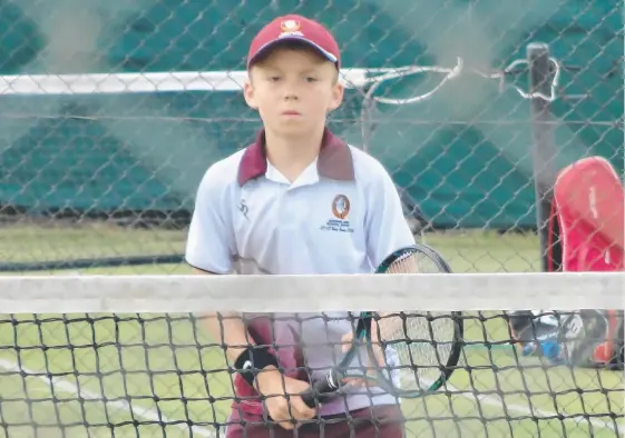  ??  ?? Young tennis ace Hayden Jones, 10, is dominating tournament­s playing above his age division.