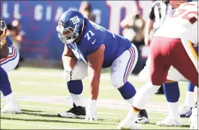  ?? Al Bello / TNS ?? Giants offensive lineman Will Hernandez in action against Washington at MetLife Stadium on Sept. 29, 2019 in East Rutherford, N. J. Hernandez tested positive for COVID-19, leaving the Giants’ offensive line shorthande­d at practice on Friday.