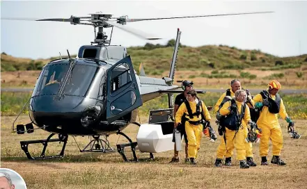  ?? DOMINICO ZAPATA/STUFF ?? A police recovery team that returned from Whakaari/White Island, unable to find two remaining bodies. Left, Colonel Rian McKinstry from the NZDF told Stuff his team went beyond limits to recover the bodies of those killed.