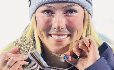  ?? Tom Pennington/Getty Images ?? Gold medalist Mikaela Shiffrin poses for a photo during the medal ceremony for Women’s Giant Slalom at the FIS Alpine World Ski Championsh­ips on Thursday in Meribel, France.