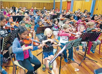  ??  ?? Playing together:
The Virtuoso
Strings Orchestra.