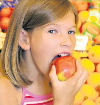  ??  ?? Morrisons Hinckley has embarked on a new scheme to provide young shoppers accompanyi­ng their parents with free pieces of fruit, giving them an opportunit­y to eat their five-a-day and reduce food waste