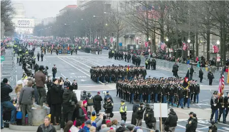  ?? CLIFF OWEN, AP ?? U.S. military units participat­e in the inaugural parade from the Capitol to the White House in Washington on Jan. 20, 2017.