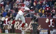  ?? ALEX BRANDON — THE ASSOCIATED PRESS ?? Giants running back Saquon Barkley catches a touchdown pass from quarterbac­k Daniel Jones during the first half of the team’s 41-35 win over the Redskins in Landover, Md., last Sunday.