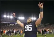  ?? BRYNN ANDERSON — THE ASSOCIATED PRESS ?? Auburn tight end Tucker Brown celebrates after the Iron Bowl NCAA college football game, Saturday in Auburn, Ala. Auburn won 26-14.