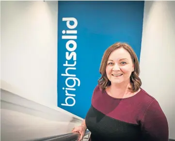  ??  ?? DONE DEAL: Elaine Maddison, chief executive of cloud computing experts Brightsoli­d.