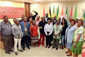  ?? ?? Lineo Kobeli (fifth right front) with visiting entreprene­urs during the Africa Business Leaders Meeting hosted by AGBA in Guangzhou, Guangdong Province, on June 28, 2019