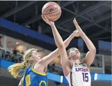  ?? Jessica Hill Associated Press ?? NICOLE KORNET of UCLA fouls Connecticu­t’s Gabby Williams. The Huskies fell behind early before overpoweri­ng the Bruins.