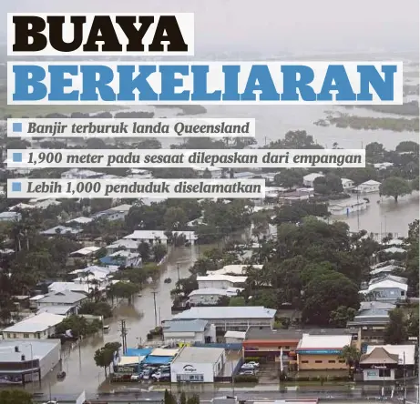  ??  ?? GAMBAR dari udara menunjukka­n keadaan rumah di bandar Townsville, Queensland, Australia yang ditenggela­mi air akibat banjir besar yang melanda kawasan itu semalam. - EPA